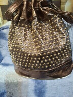 Metallic Brown Studded Drawstring Shoulder Bag